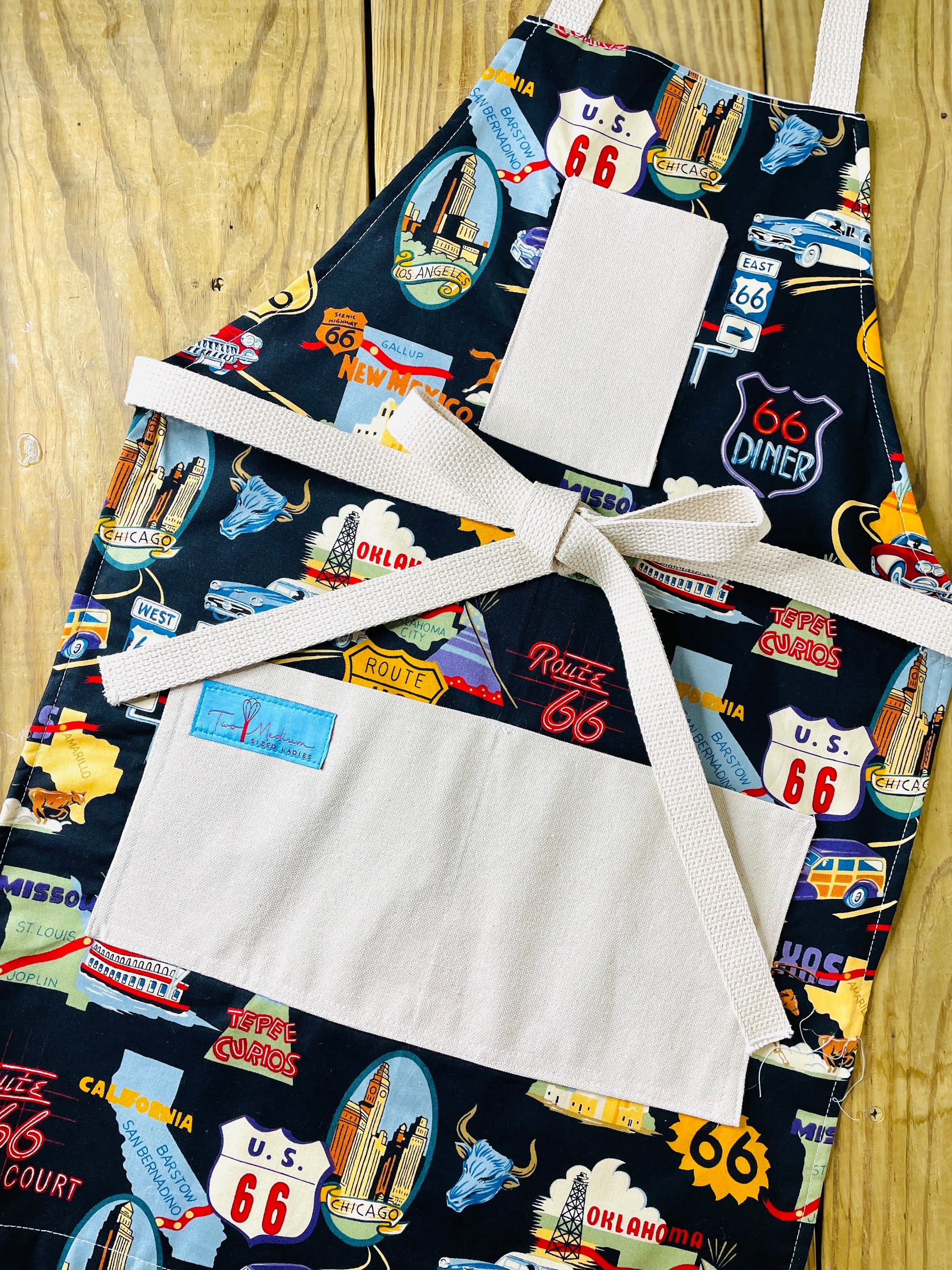 Two Medium Sized Ladies original design handmade in Texas aprons Route 66 collection historic
